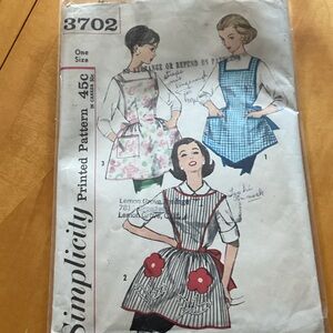 Simplicity Apron Pattern with Blue, Red, and Black Designs